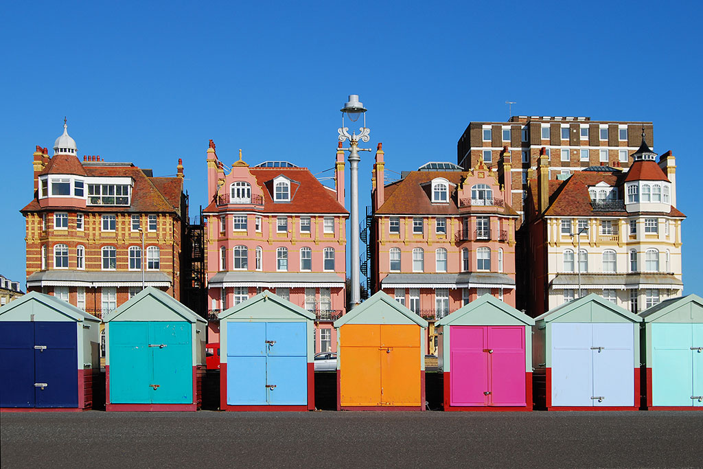 Private investigator Brighton multi-coloured beach huts