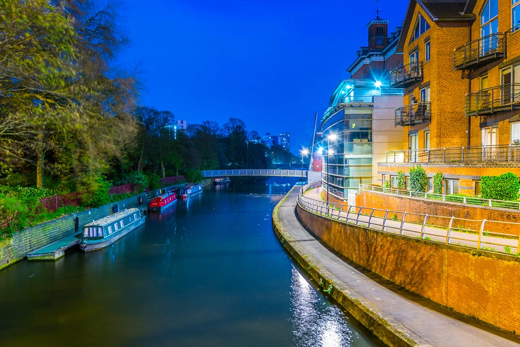 Private investigator Leicester night view of riverside of river Soar in Leicester, England