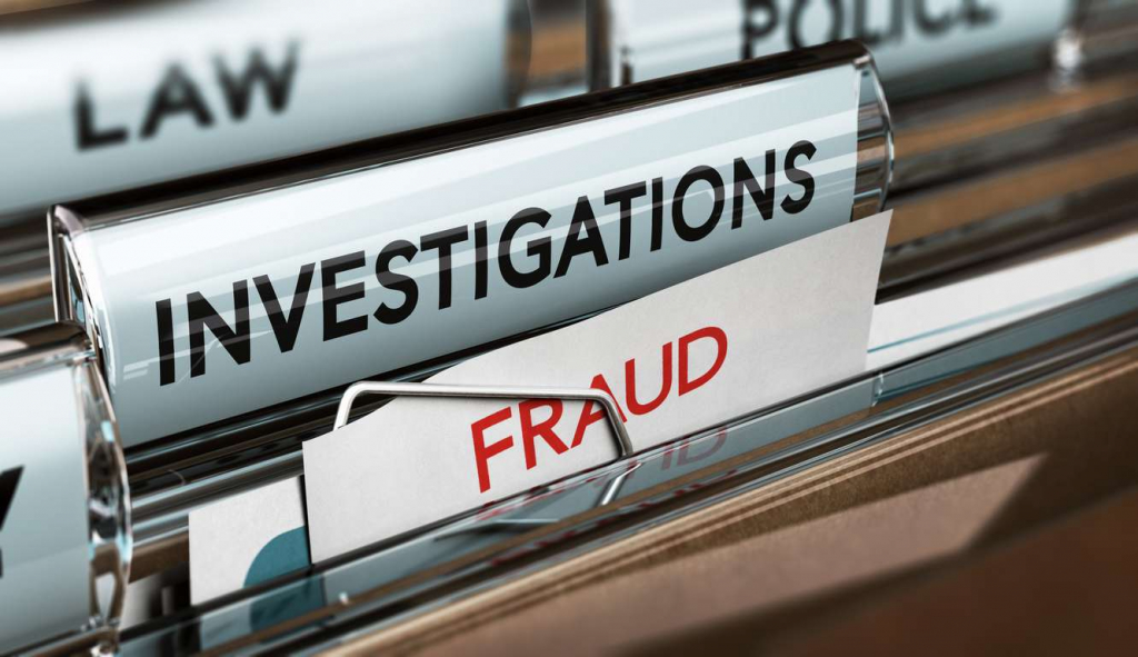 Filing cabinet with fraud investigation files and evidence